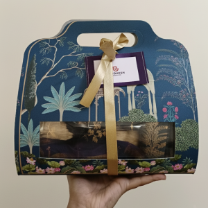 A festive-themed gift box with treats.